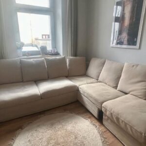 Ecksofa beige mit Schlaffunktion und integrierter Matratze